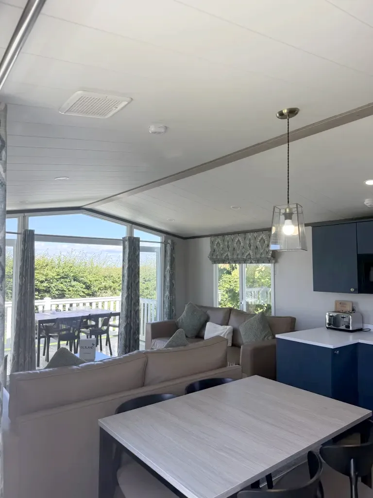 The open-plan lounge in a Gold Caravan at Gilsland Park, North Berwick