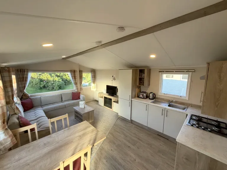 The lounge and kitchen in a Silver Caravan at Gilsland Park, North Berwick
