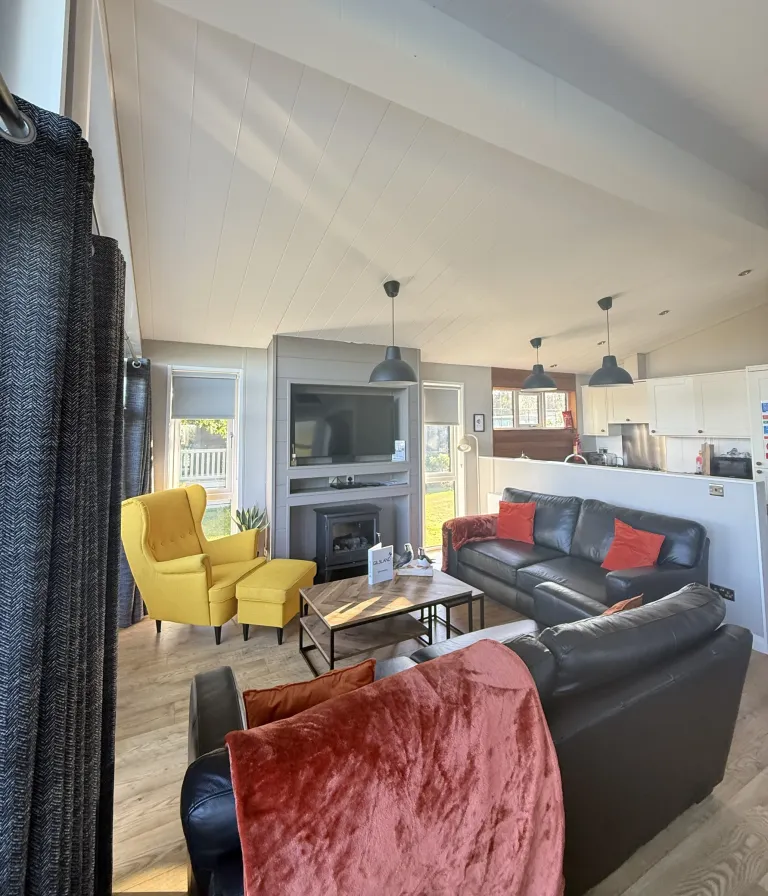 The open-plan living area and kitchen at Puffin Lodge, Gilsland Park