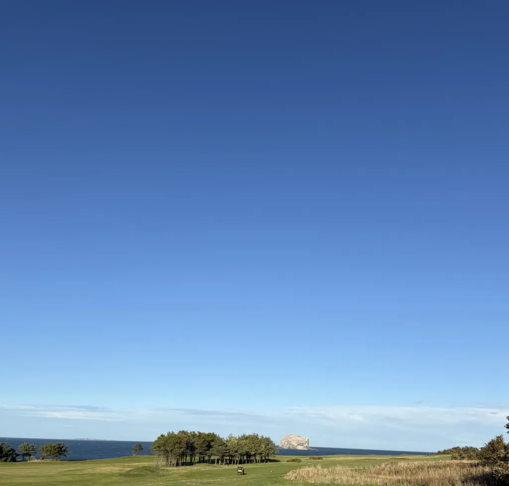 Golf course in North Berwick with the Bass Rock on the horizon